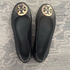 Tory Burch Black and Gold Flats with Signature Medallion